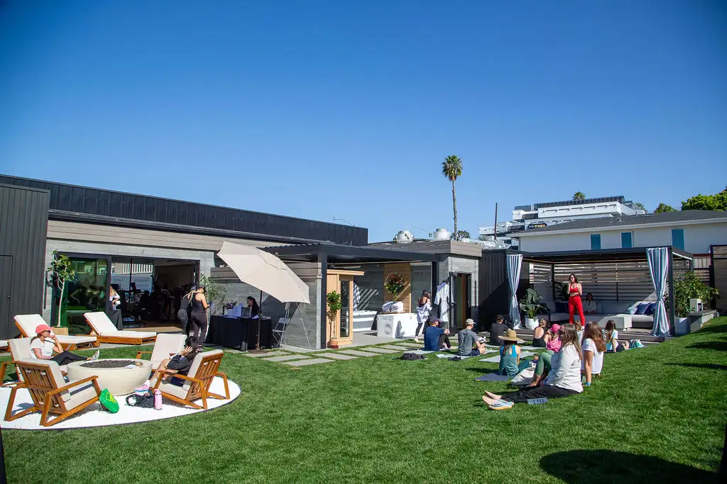 Members gathered on the lawn during a Bluprint Wellness community event